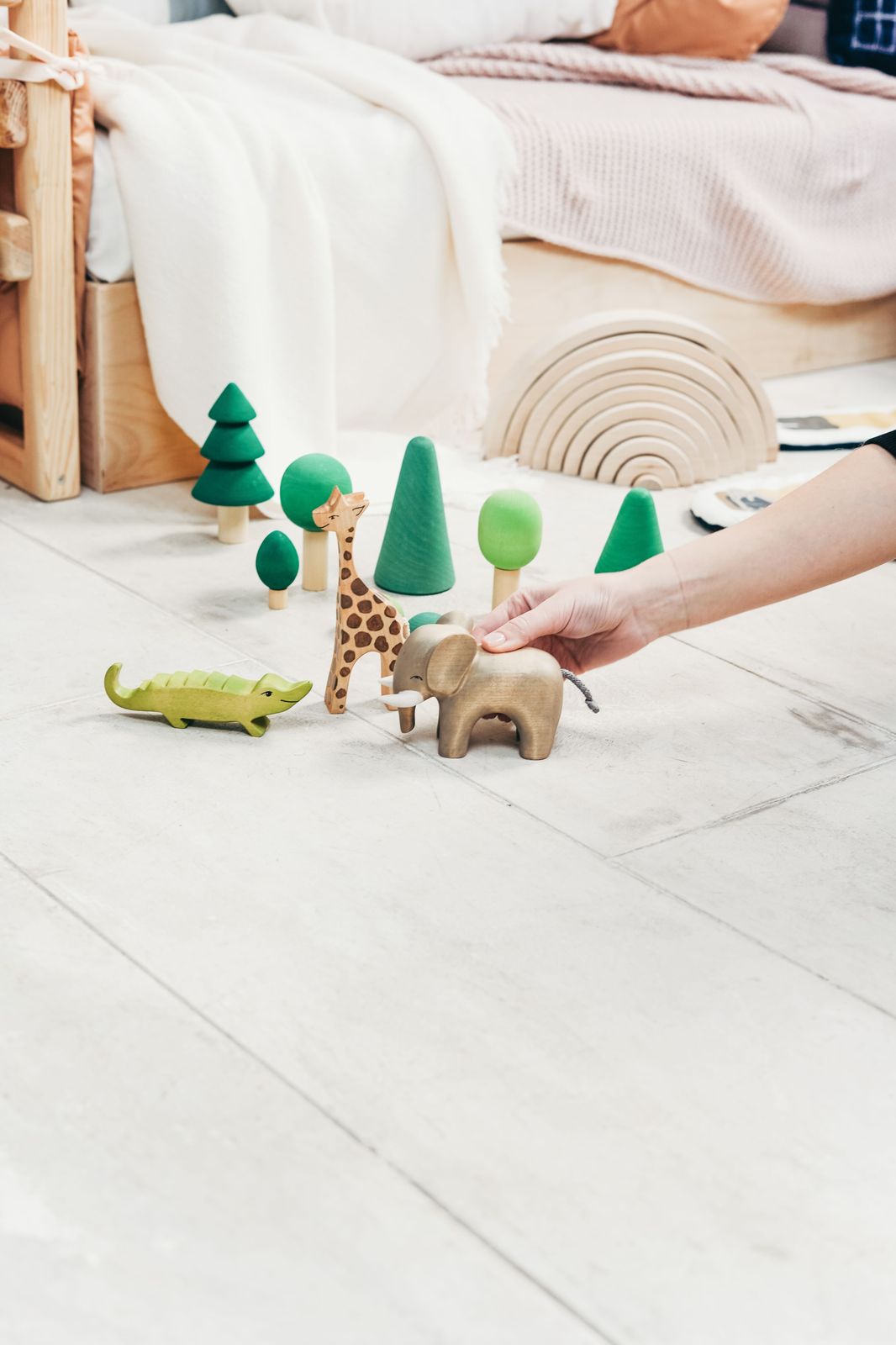 Wooden animal figures used in Montessori practical life work